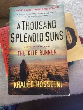 A Thousand Splendid Suns by Khaled Hosseini - Sunset Tones Paperback